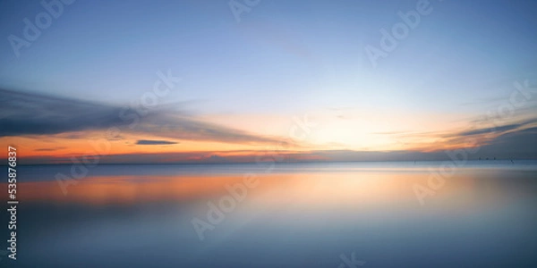 Obraz Calm colored sea and sky at sunset