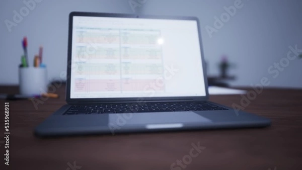 Fototapeta Creative designer desk with empty laptop screen and supplies in modern office. Mock up, 3D Rendering