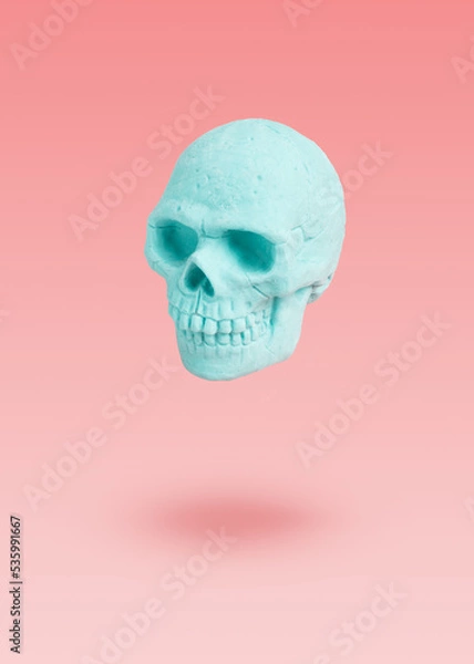 Obraz Mint skull levitation on a purple background. pastel concept