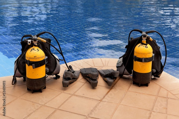 Fototapeta aqualung and flippers near the pool