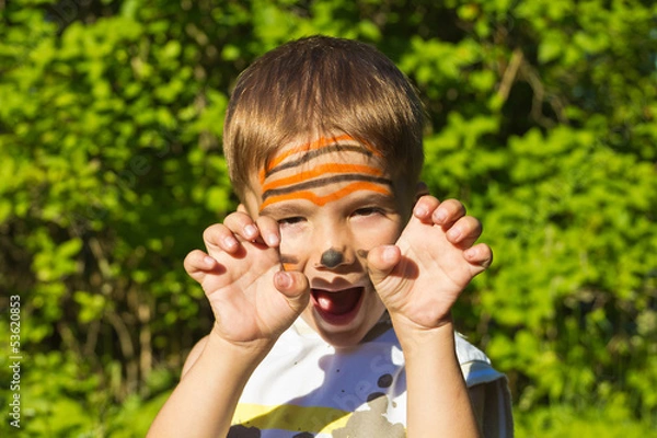 Fototapeta a child with a painted face