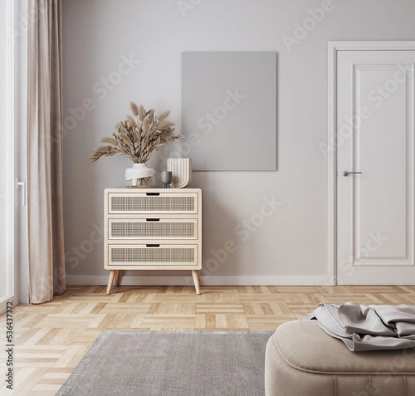 Fototapeta Minimalistic interior design. empty poster frame in modern interior background with boho style dresser and decorations
