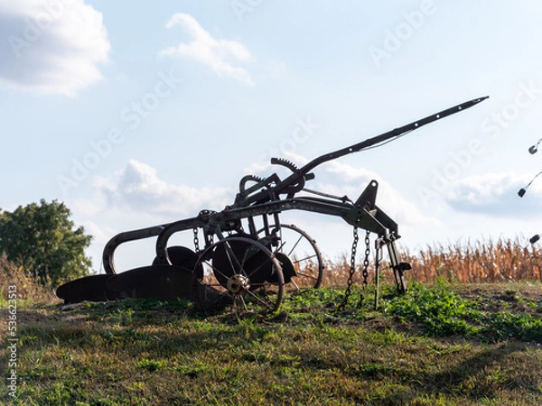 Fototapeta old farm equipment 