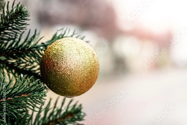 Fototapeta Christmas and New Year tree with a round ball, Christmas tree decoration