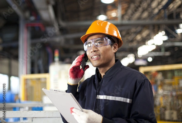 Obraz Industrial engineer talking phone