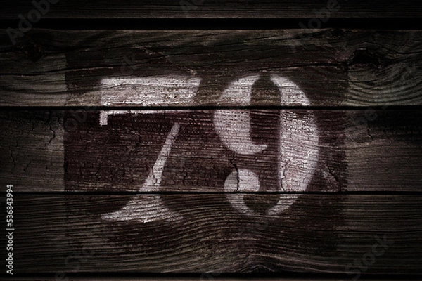 Fototapeta old 79 (seventy-nine) painted on ancient wood plank. background with text