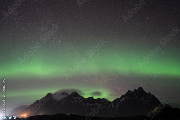 Obraz aurora borealis above the clouds