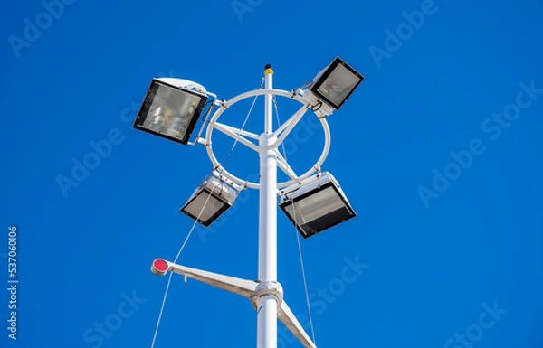 Obraz street lamp against the blue sky