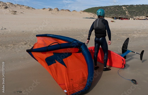Fototapeta person wind foiling in tarifa