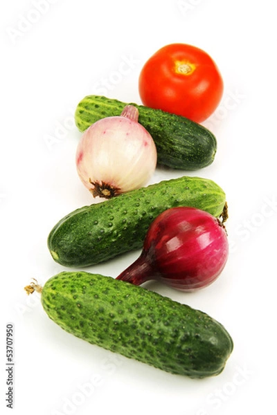 Fototapeta green cucumber, red tomato and young onions.