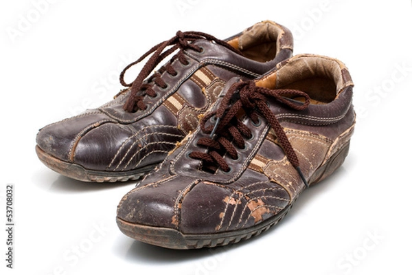 Fototapeta Old Leather shoes brown color on white background