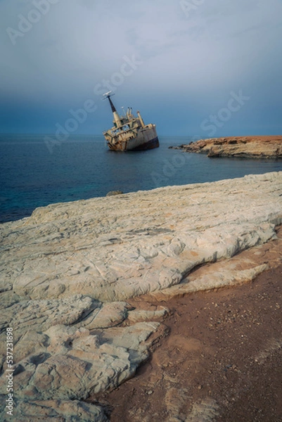 Fototapeta Stranded old boat wreck at the coast of Cyprus