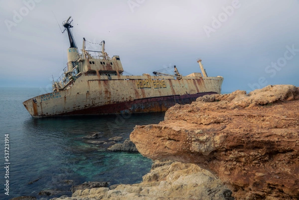 Obraz Stranded old boat wreck at the coast of Cyprus