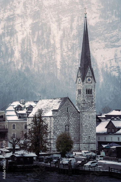 Obraz Small church in Hallstatt, Austria during a cold and snowy winter day.