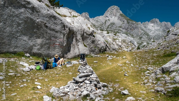Fototapeta mountain view of the peaks of the Balkan. high mountains, blue skys. person in the middle
