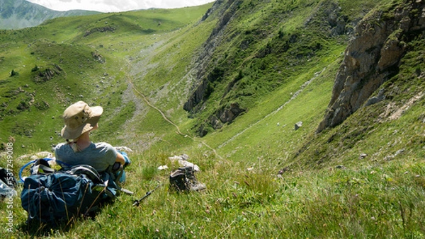 Fototapeta mountain view of the peaks of the Balkan. high mountains, blue skys. person in the middle

