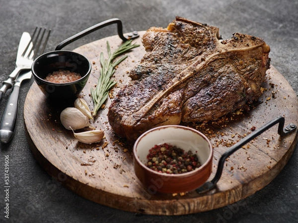 Obraz Grilled BBQ T-Bone Steak. Close up of a succulent tender grilled porterhouse steak.