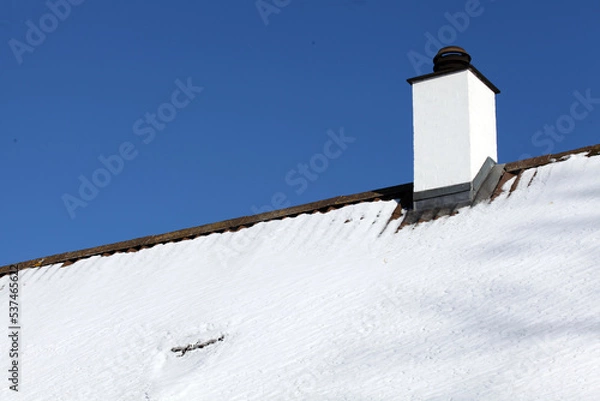 Obraz Snowy roof and chimney