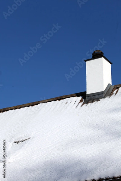 Obraz Snowy roof and chimney