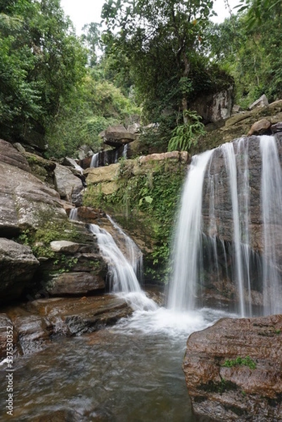 Fototapeta waterfall in the woods long exposure