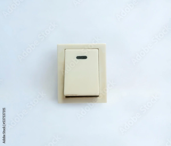 Obraz white electric switch on white background