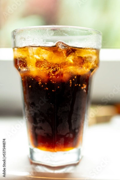 Fototapeta glass of cola with ice