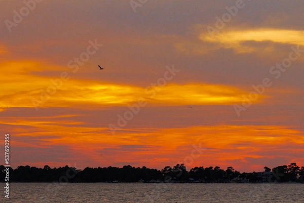 Fototapeta sunset over water