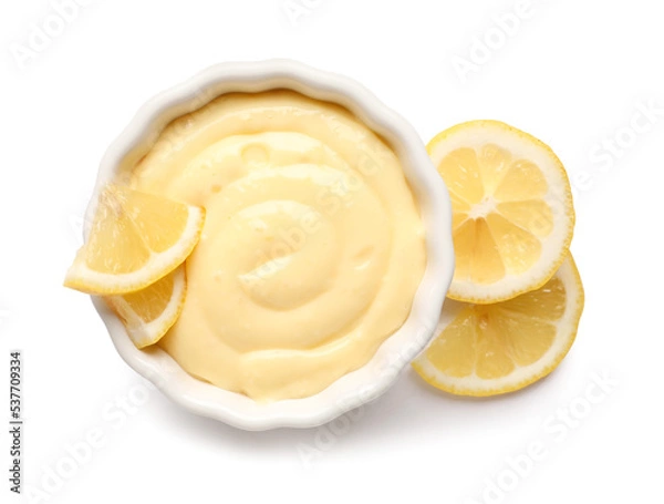 Obraz Ramekin of delicious vanilla pudding and lemon on white background