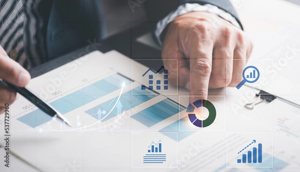 Fototapeta Businessmen analyze market reports with statistics from charts and graphs, managing business and financial strategies, professional analysts view investment information, consulting and presentations.