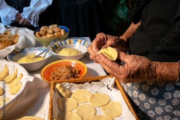 Fototapeta preparation of Sardinian culurgiones. Typical fresh pasta filled with potatoes and mint