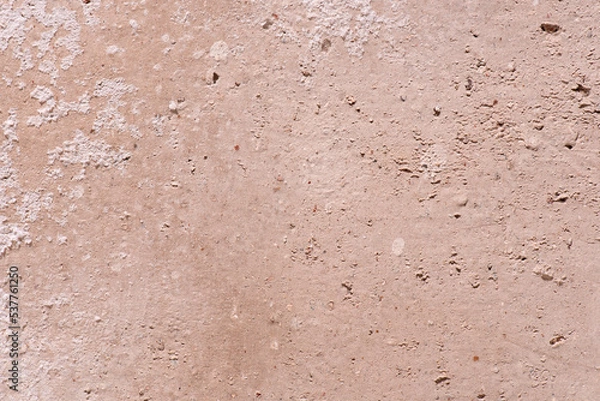 Fototapeta Textura pare y muro de casa de pueblo, pared antigua, con textura y dia, colores rosados, textura y fondo 