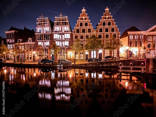 Obraz Haarlem at night, along the Donkere Spaarne river in the Netherlands