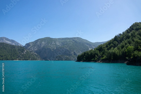 Fototapeta View of the lake and mountain cliffs in the area of the Oimapinar dam. Landscape of Green canyon, Manavgat, Antalya, Turkey
