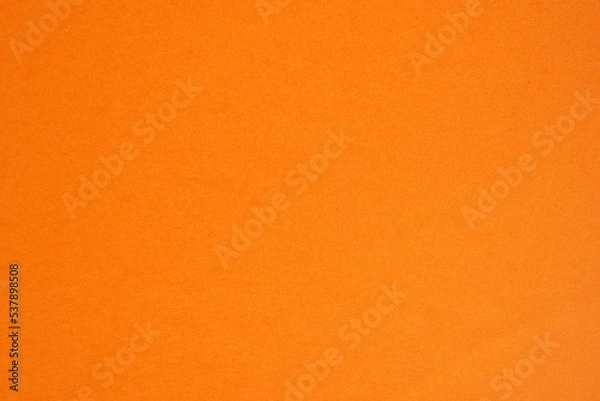 Fototapeta Photo of sheet of orange cardboard paper with smooth surface background