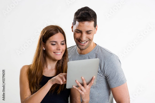 Obraz Pareja con tablet