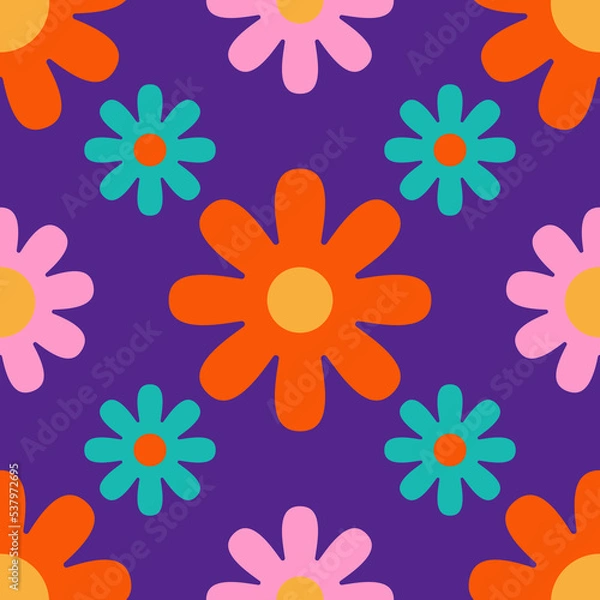 Fototapeta Hippy floral seamless pattern on a purple background. Bright background with cute flowers in 1970s flat cartoon style. Can be used as a wallpaper, wrapping paper, textile print etc.