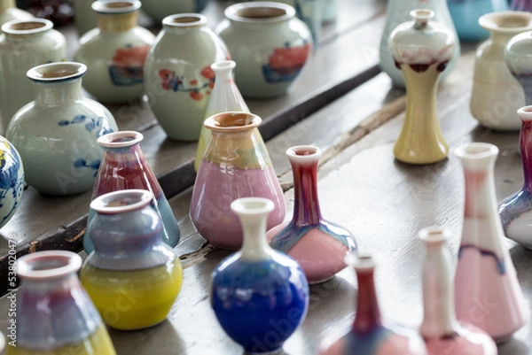 Obraz Arranged colorful flower arrangement vases
