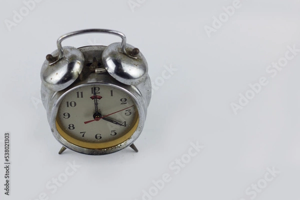 Fototapeta closeup classic clock alarm isolated at white background