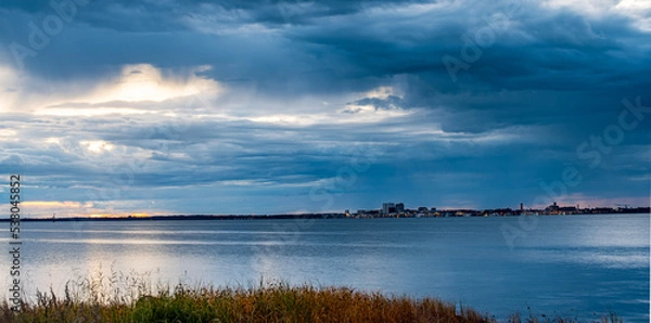 Fototapeta sunset over the river