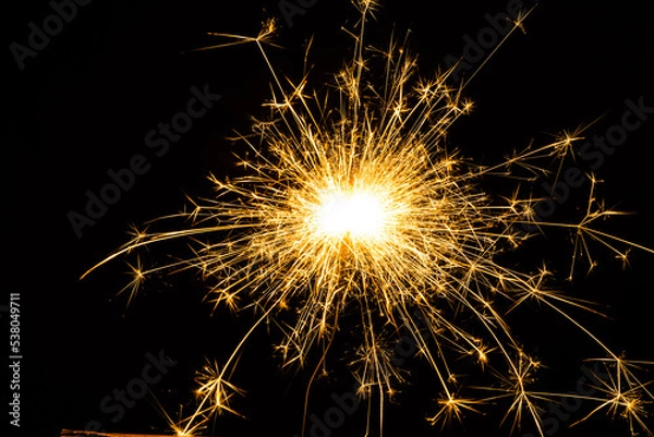 Fototapeta sparkler on black background