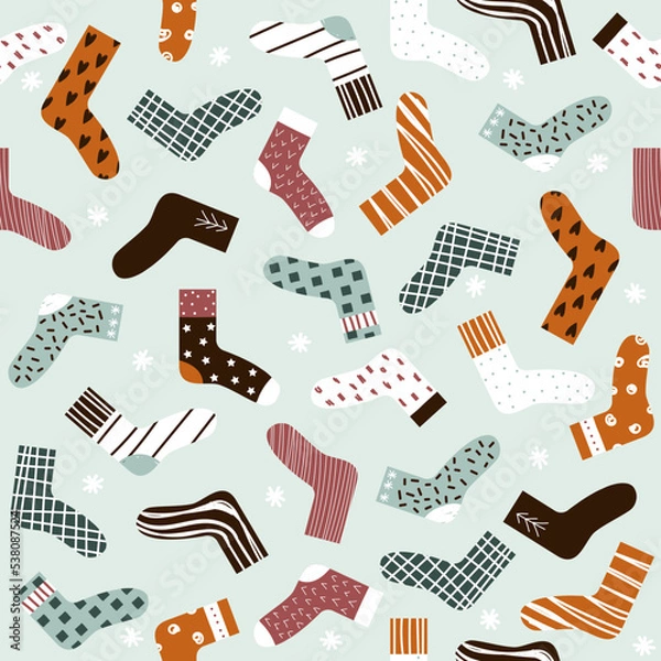 Fototapeta Seamless pattern with colorful socks. Winter print. Vector hand drawn illustration.