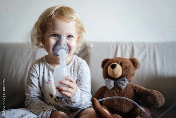 Fototapeta Portrait of a Child in an inhalation mask. Children's lung health.