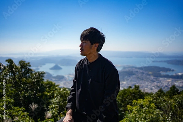 Fototapeta 山頂の男性モデル