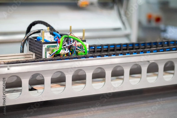 Fototapeta Digital cutting and milling machine - cnc flatbed plotter at factory, exhibition. Automated technology, industrial, robotic, electronic, production, manufacturing concept