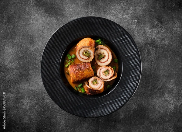 Obraz Pork roulade with pickles and bacon, served with demiglace meat sauce