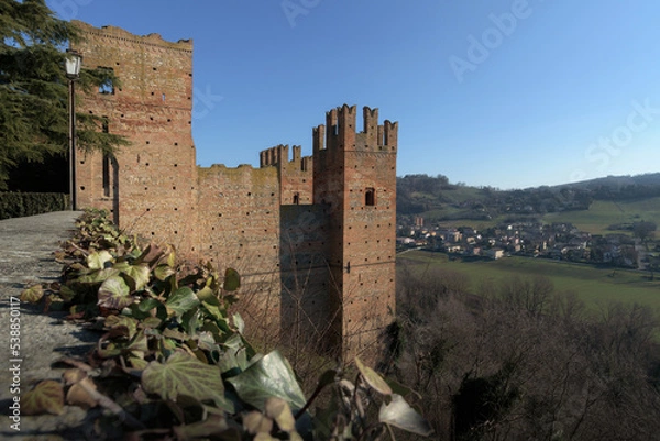 Fototapeta Winter exterior view from afar of the town of Castell’Arquato, medieval village in Emilia Romagna, beautiful contryside of italy with many castles between the cities of Parma and Piacenza