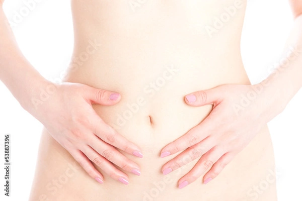 Obraz Kobieta, która dotyka brzucha