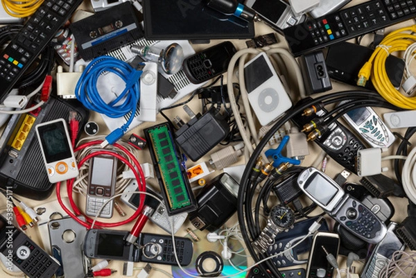 Fototapeta Old out of date technology. Electrical items no longer of any use. Obsolete electrical waste for recycling.