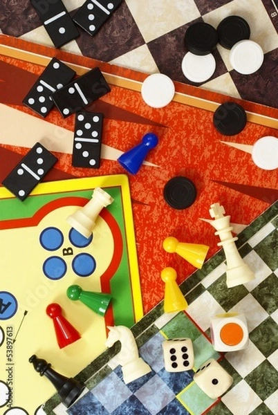 Obraz Top view of board games, pawns, chessmen, dominoes and dices.