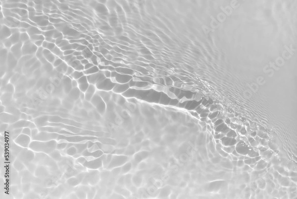 Fototapeta Water texture with wave sun reflections on the water overlay effect for photo or mockup. Organic light gray drop shadow caustic effect with wave refraction of light. Banner with copy space.